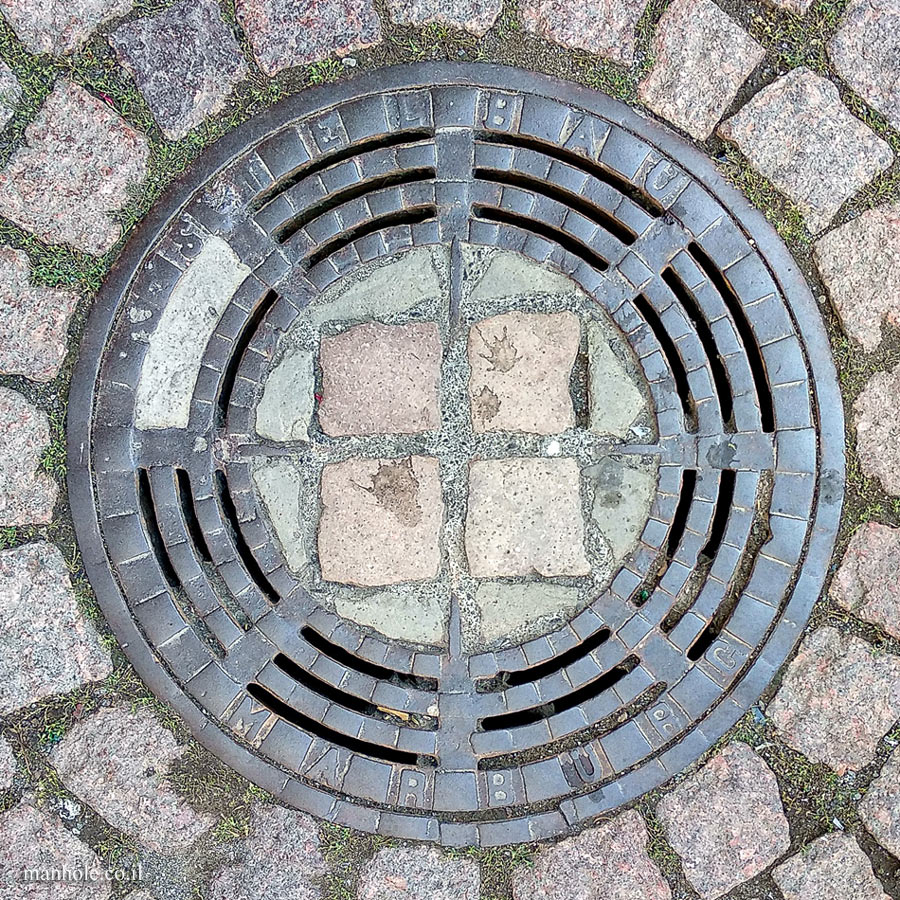 Marburg - Concrete cover surrounded by metal rings
