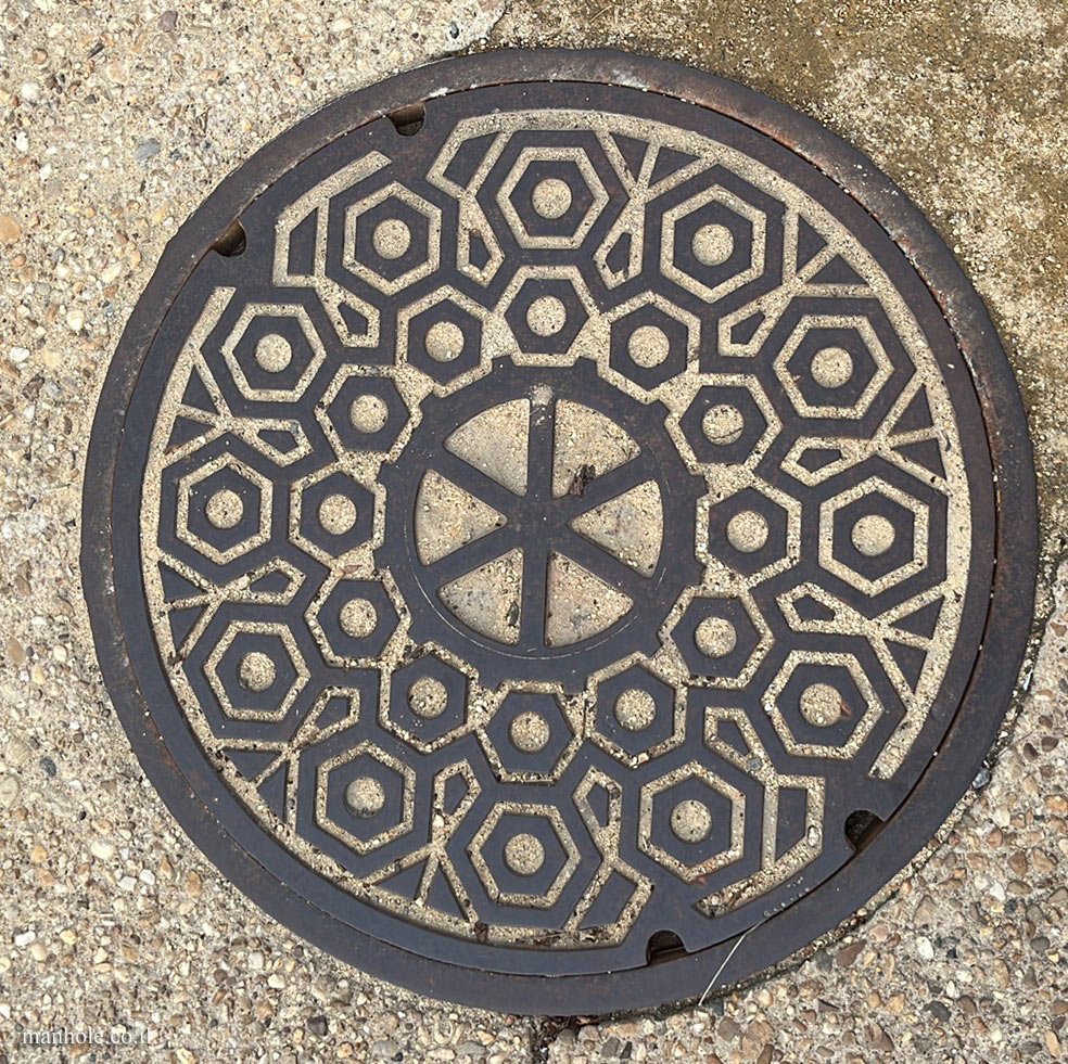 Washington D.C.- A lid with a circle in the center divided into 6 segments
