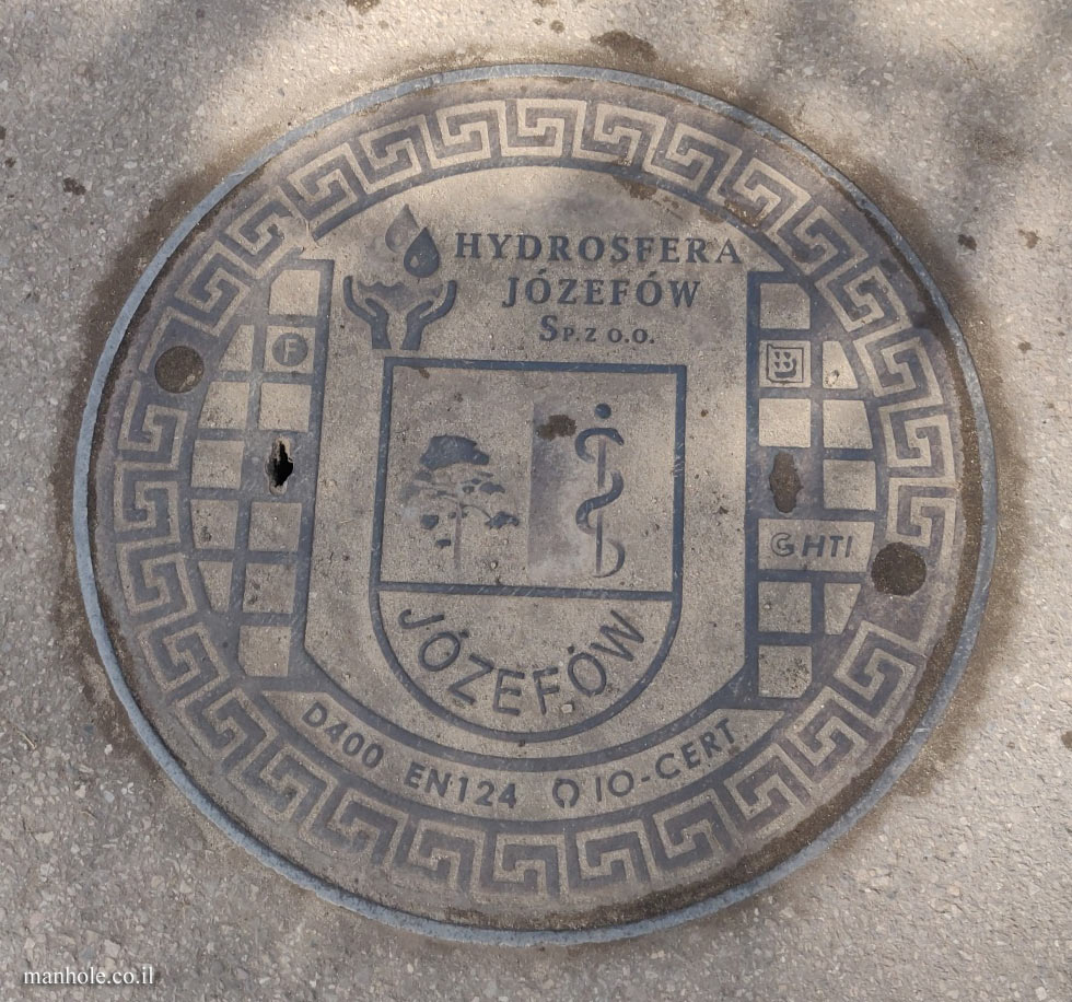 Józefów - Cover with the city emblem on it