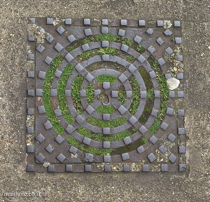 London - a lid with circles of squares intersected by diagonals