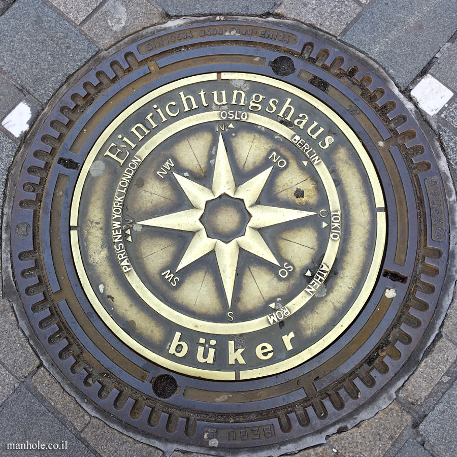 Dortmund - Golden lid with compass rose indicating the furniture company Büker