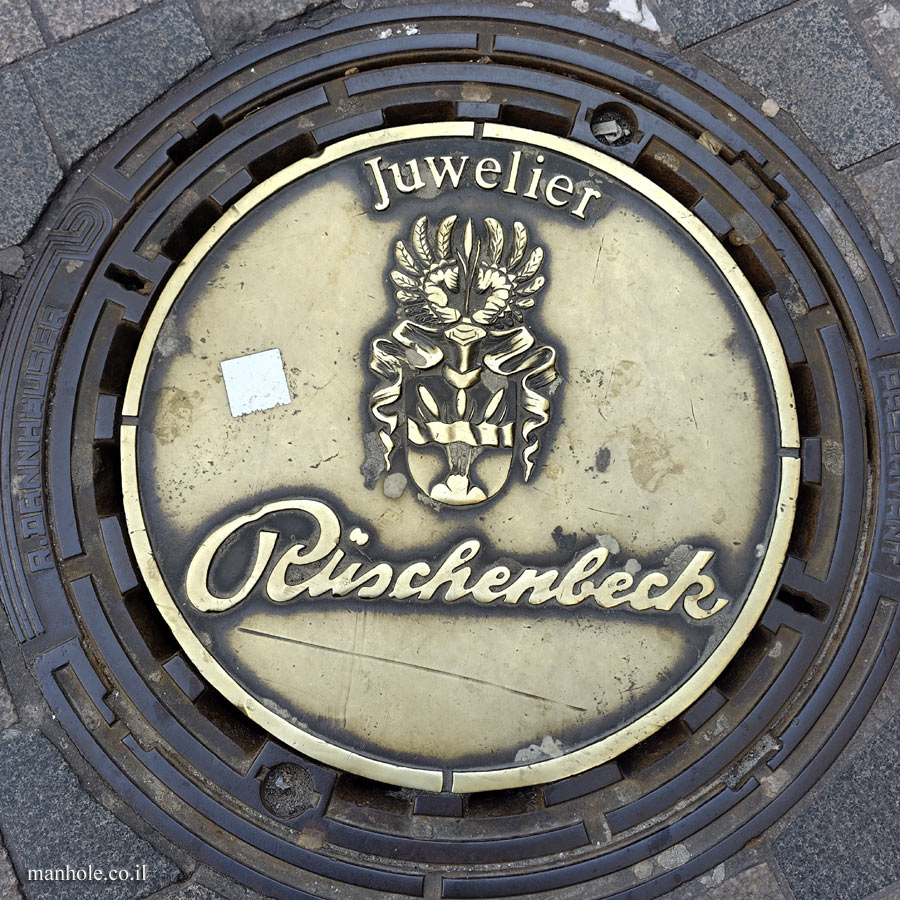 Dortmund - Golden lid with the emblem of the Rüschenbeck jewelry store