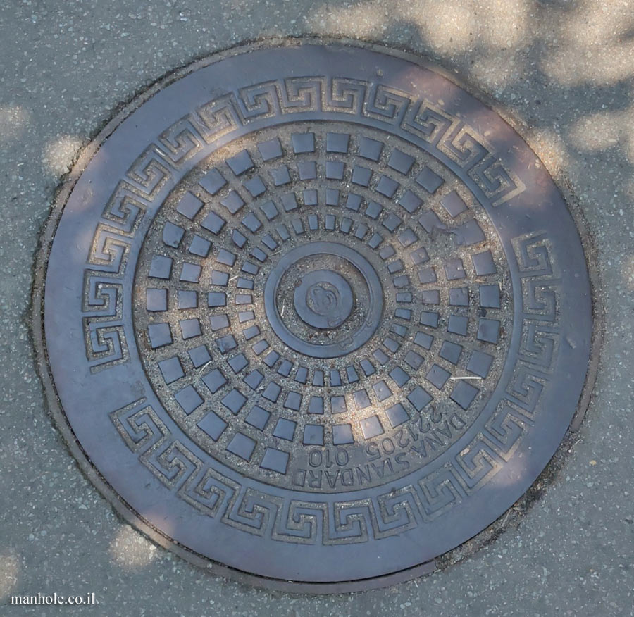 Frederiksberg - a lid with a logo in the center and circles of squares around