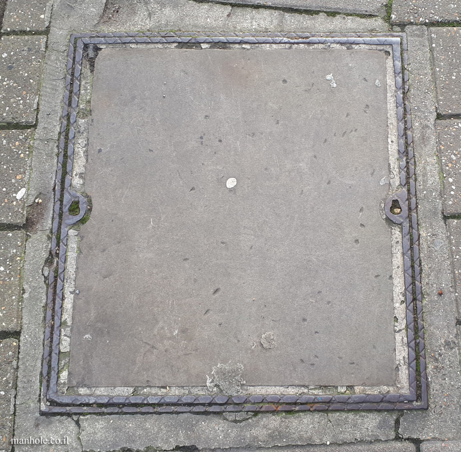 London - Concrete cover with a thin metal frame