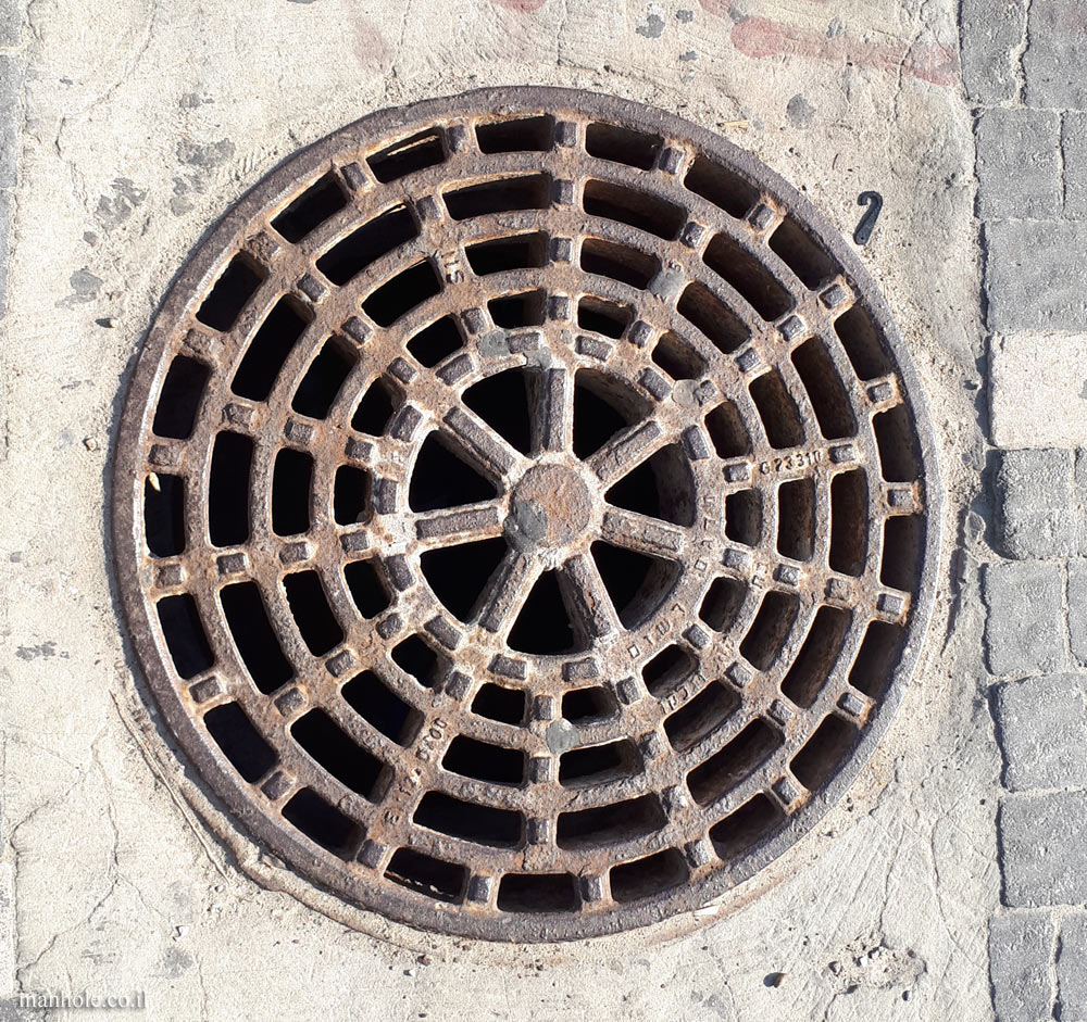 Tel Aviv Port - A drain cover in the shape of a web