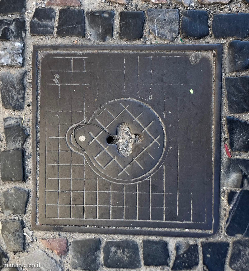 Prague - A lid with a lifting handle in the shape of a drop of water