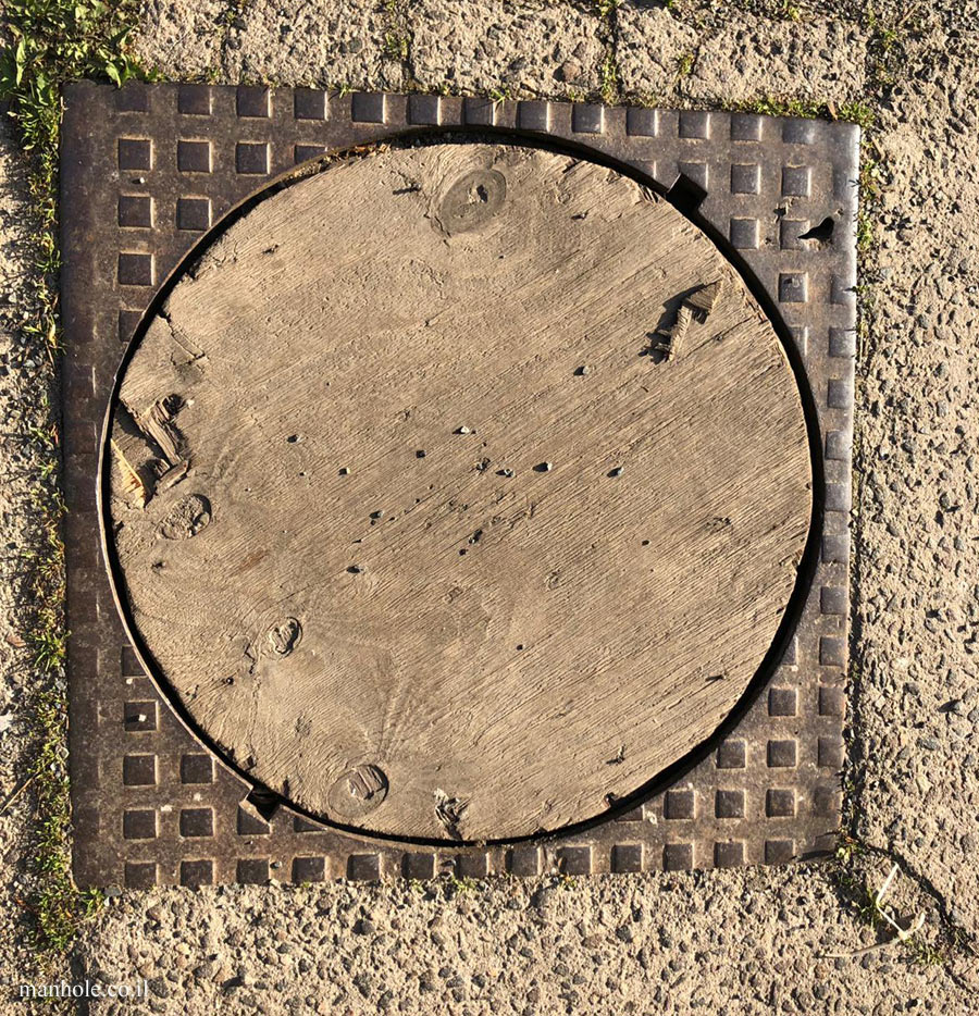 Berlin - a wooden lid surrounded by a metal frame