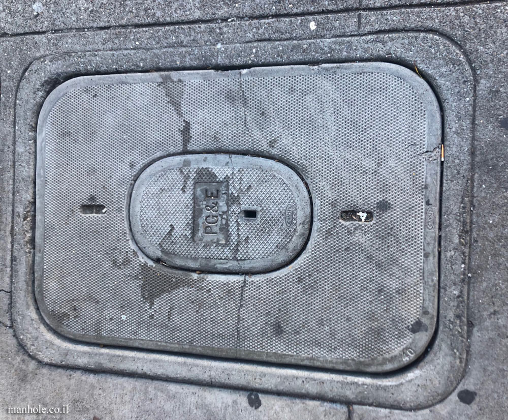 San Francisco - PG&E - elliptical cover surrounded by a rectangular frame