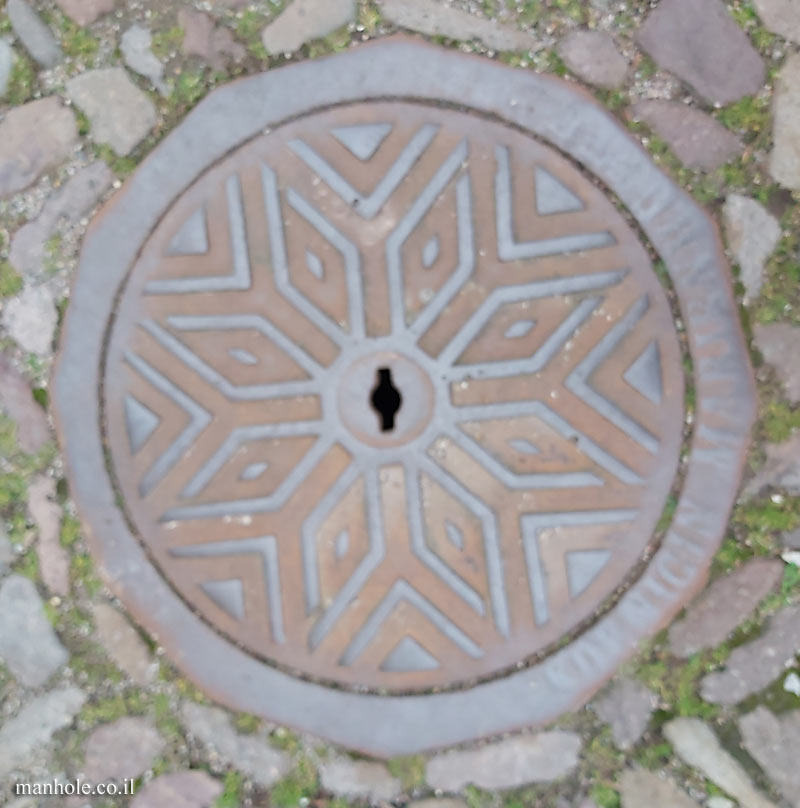 Arnstadt - A lid with a background similar to a snowflake