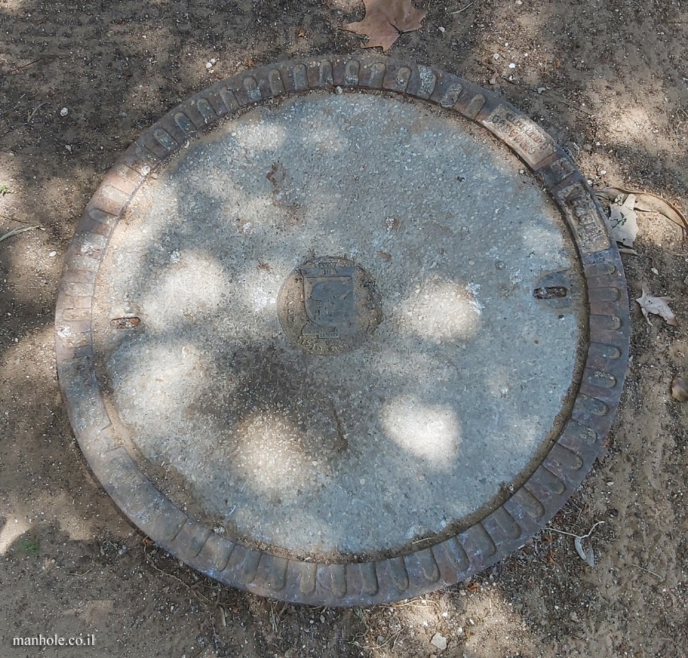 Sewer cover from Holon in the yard of a house in Tel Aviv
