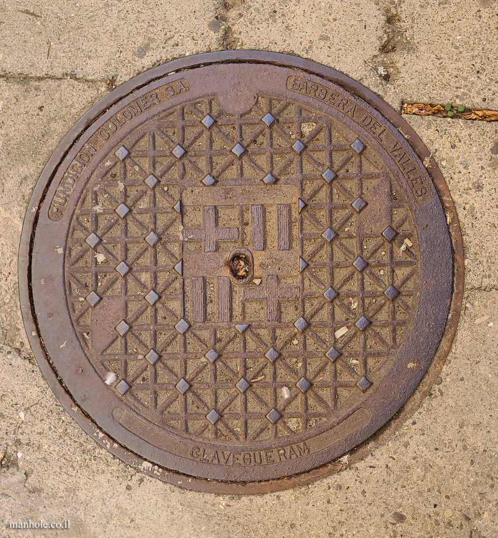 Barcelona - Sewage cover with the city flag in the center (2)