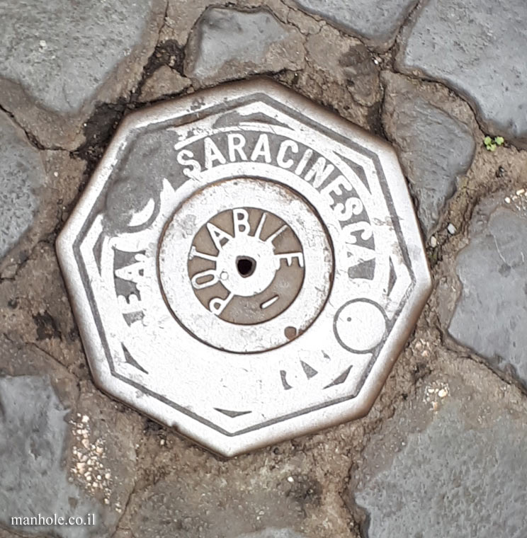 Rome - A small octagonal water cover 6