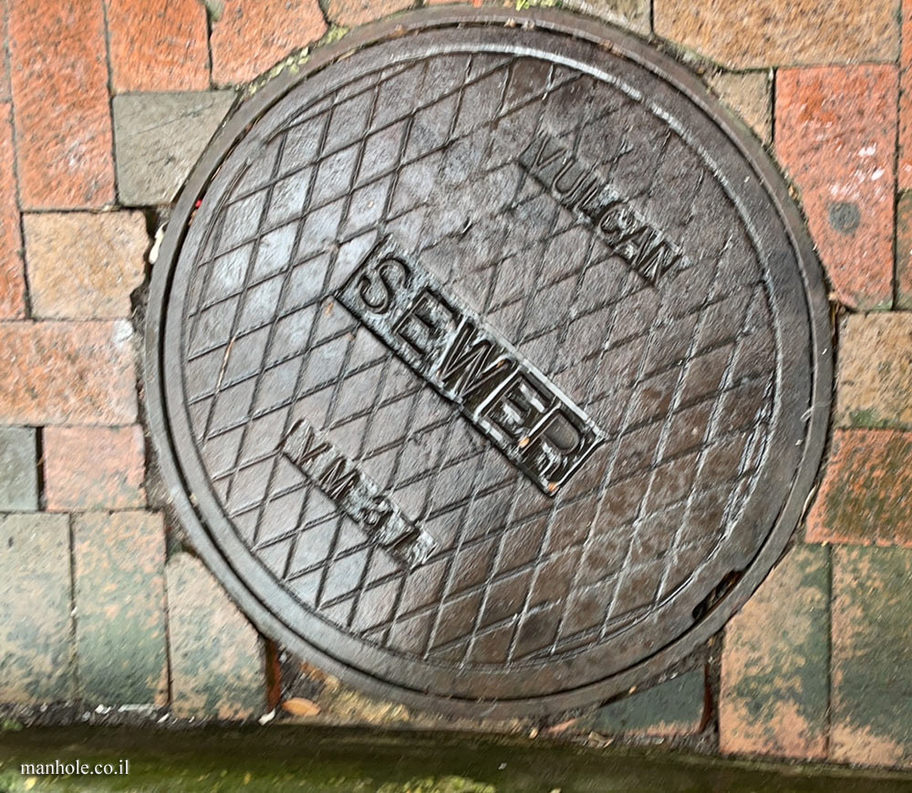 Pensacola - Vulcan - Sewage manhole cover