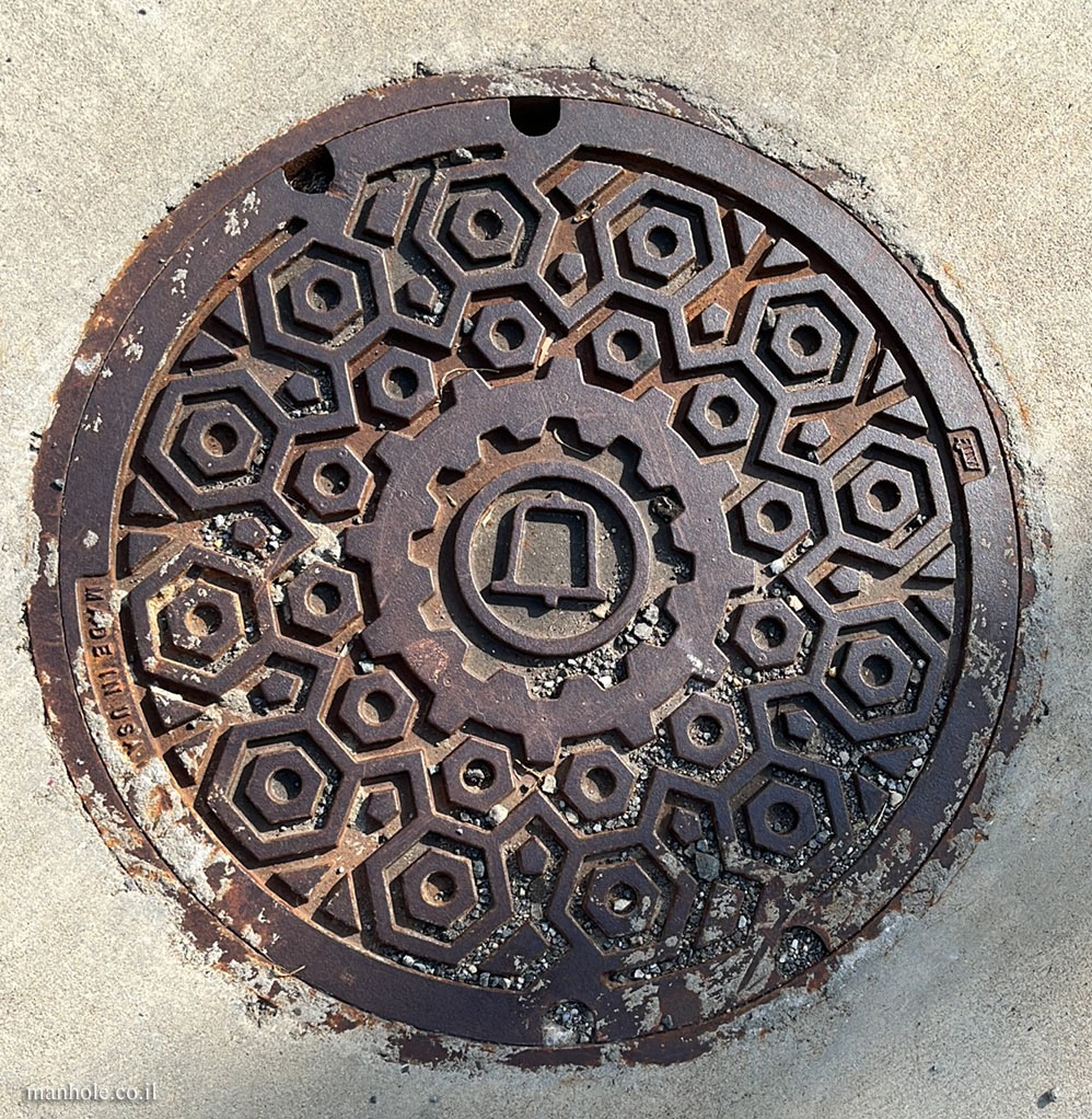 Newark, DE - A lid with the "bell" of the Bell system
