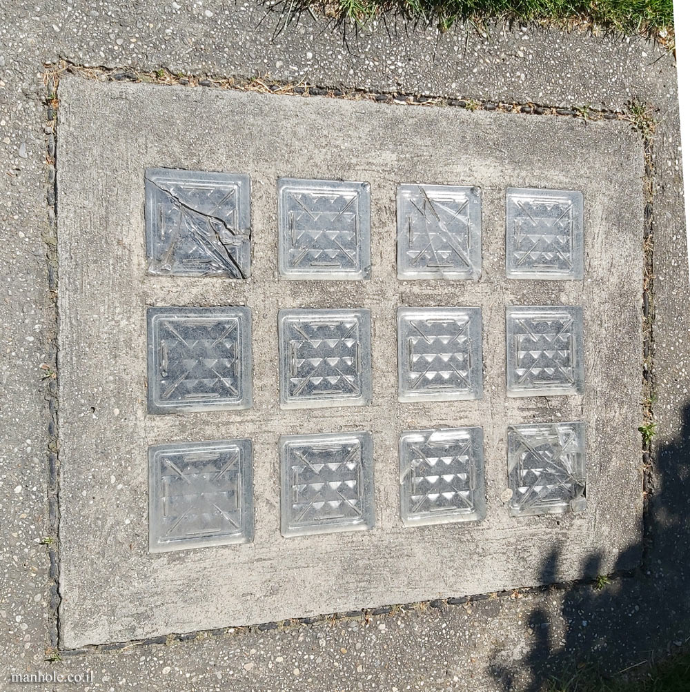 Vienna - a concrete cover with a matrix of transparent squares