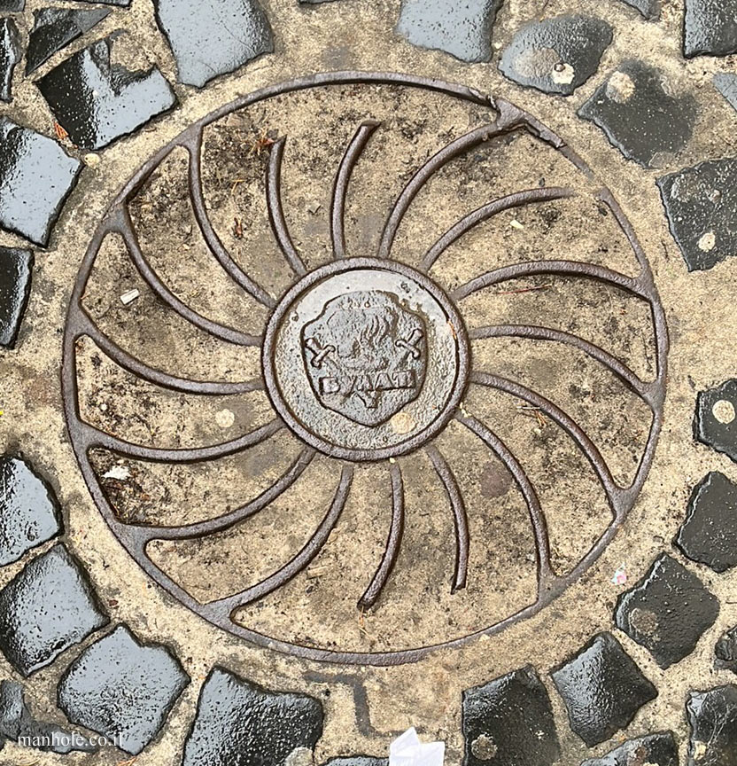 Lviv - A lid with a symbol in the center