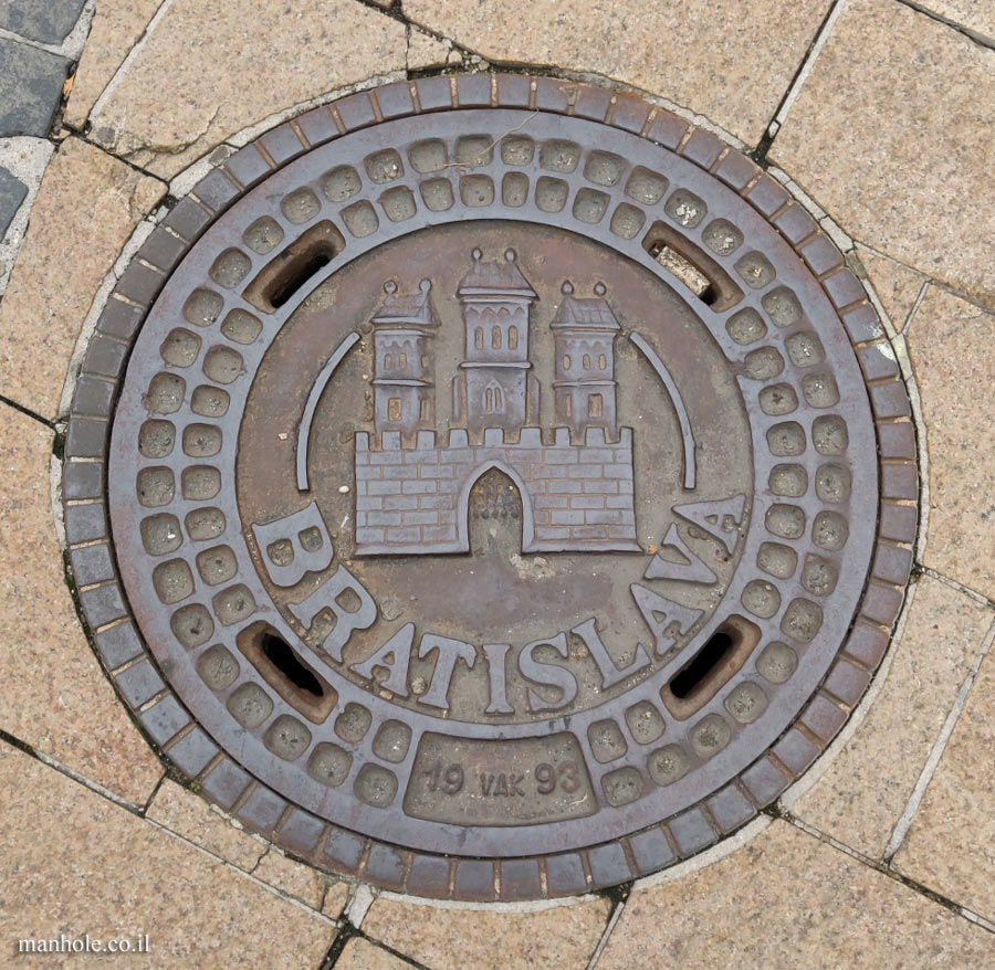 Bratislava - a lid with the city emblem on it