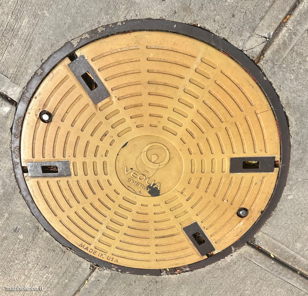 Boston - a manhole cover intended for the energy company Veolia
